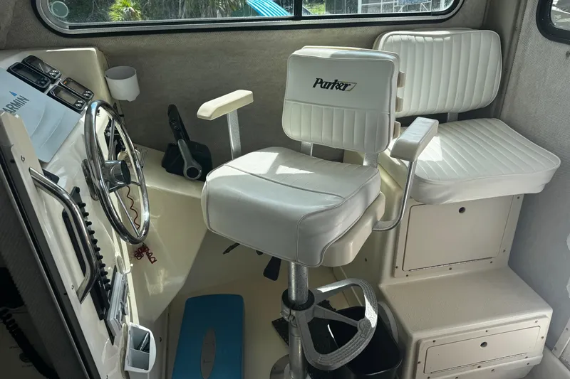 Slide: The Image of Interior of 2007 Parker 2520 XLD Sport Cabin with steering wheel and seating. - 9