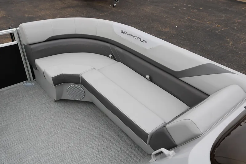 Slide: The Image of Luxurious seating on 2026 Bennington 20SXSNP REAR FISH boat, featuring sleek gray upholstery. - 15
