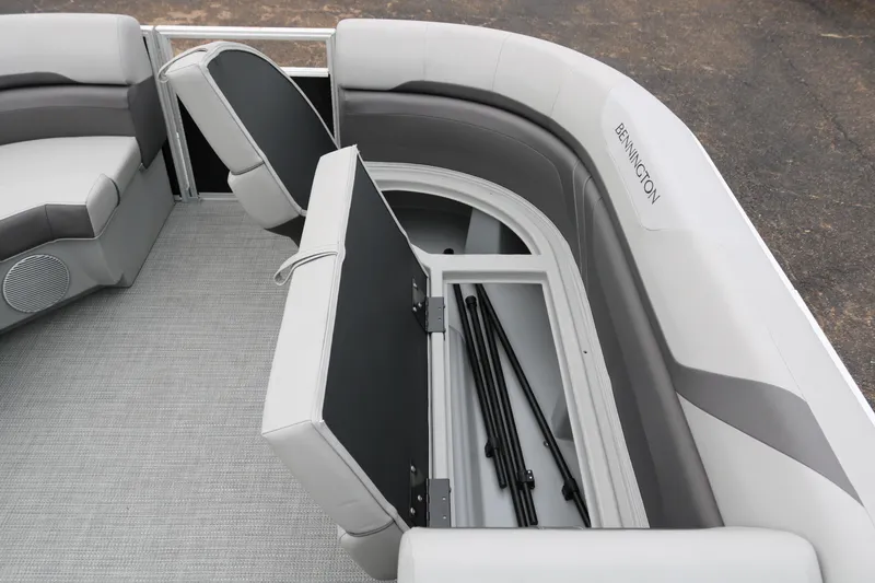 Slide: The Image of 2026 Bennington 20SXSNP REAR FISH boat interior with gray seating and storage compartment. - 16