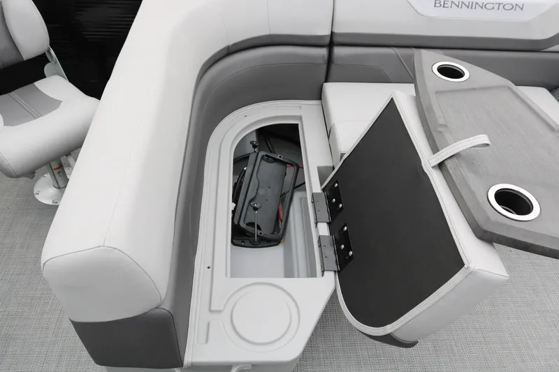 Slide: The Image of 2026 Bennington 20SXSNP REAR FISH boat interior with storage and cupholders. - 27