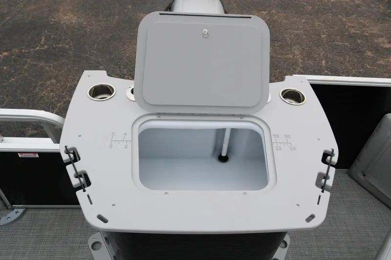 Slide: The Image of 2026 Bennington 20SXSNP REAR FISH boat console with cup holders and measurement markings. - 31