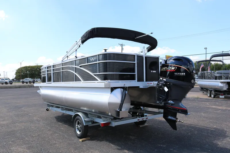 Slide: The Image of 2026 Bennington 20SXSNP Rear Fish pontoon boat with Yamaha motor on trailer. - 5