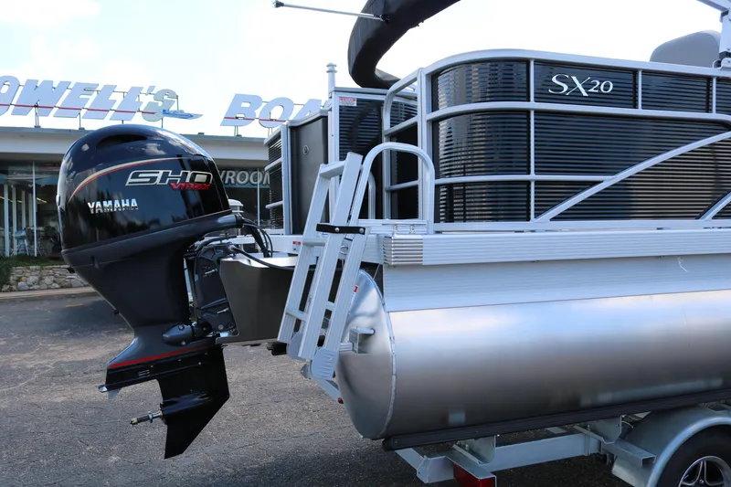 Slide: The Image of 2026 Bennington 20SXSNP pontoon boat with Yamaha VMAX SHO outboard motor. - 8