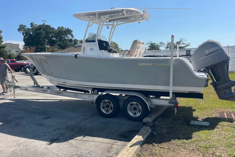 Slide: The Image of 2019 Sportsman Open 242 Center Console boat on trailer with Yamaha engine. - 4