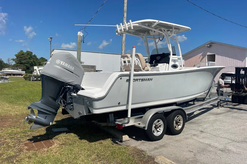 Slide: The Image of 2019 Sportsman Open 242 Center Console boat on trailer with Yamaha engine. - 8