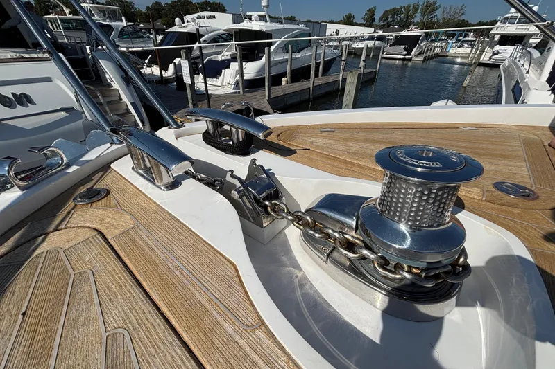 Slide: The Image of 2018 Sunseeker Predator 74 yacht deck with anchor chain and winch system. - 33