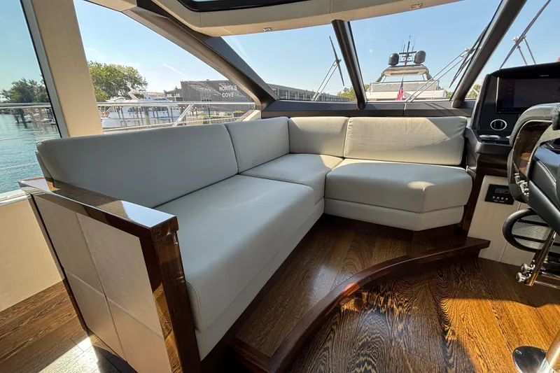 Slide: The Image of Luxurious interior of 2018 Sunseeker Predator 74 yacht with elegant seating and wooden flooring. - 43