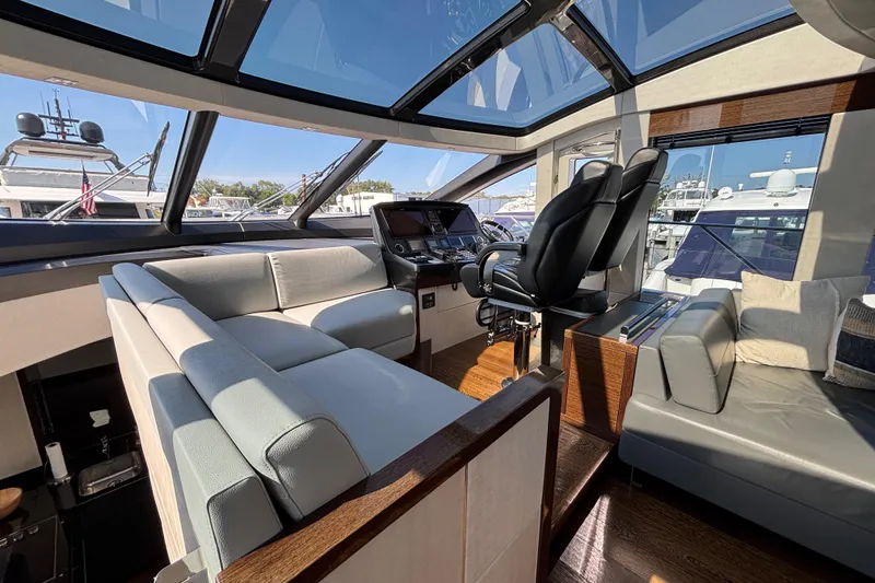 Slide: The Image of Luxurious interior of 2018 Sunseeker Predator 74 yacht with modern seating and helm. - 44