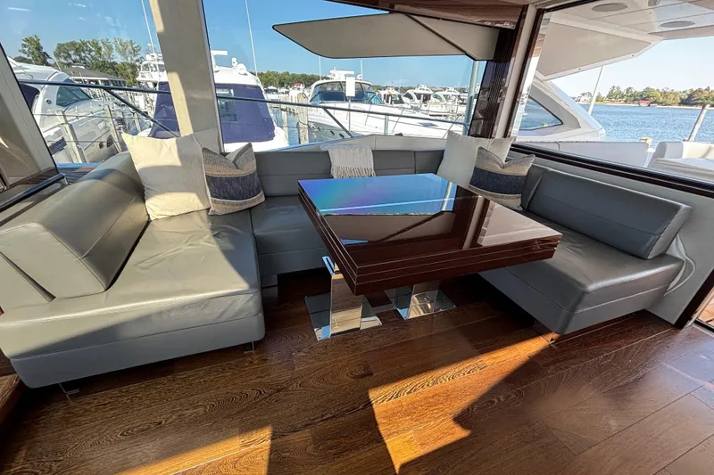 Slide: The Image of Luxurious interior of 2018 Sunseeker Predator 74 yacht with elegant seating and table. - 47