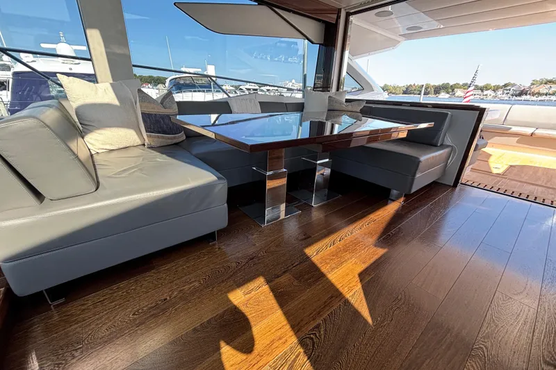 Slide: The Image of Luxurious interior of 2018 Sunseeker Predator 74 yacht with elegant seating and wooden flooring. - 48