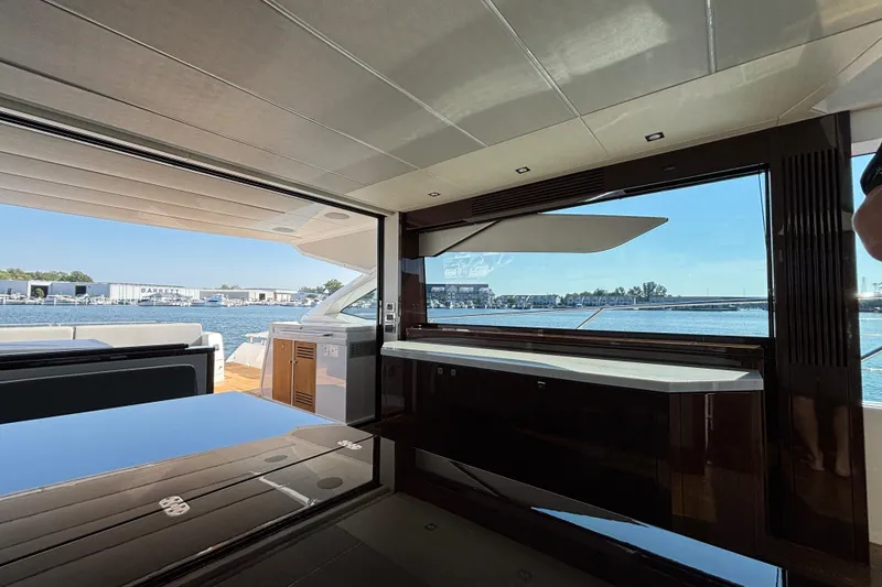 Slide: The Image of Luxurious interior of 2018 Sunseeker Predator 74 yacht with waterfront view. - 50