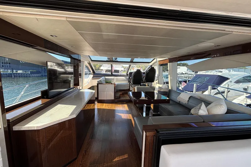 Slide: The Image of Luxurious interior of a 2018 Sunseeker Predator 74 yacht with elegant seating and modern design. - 54