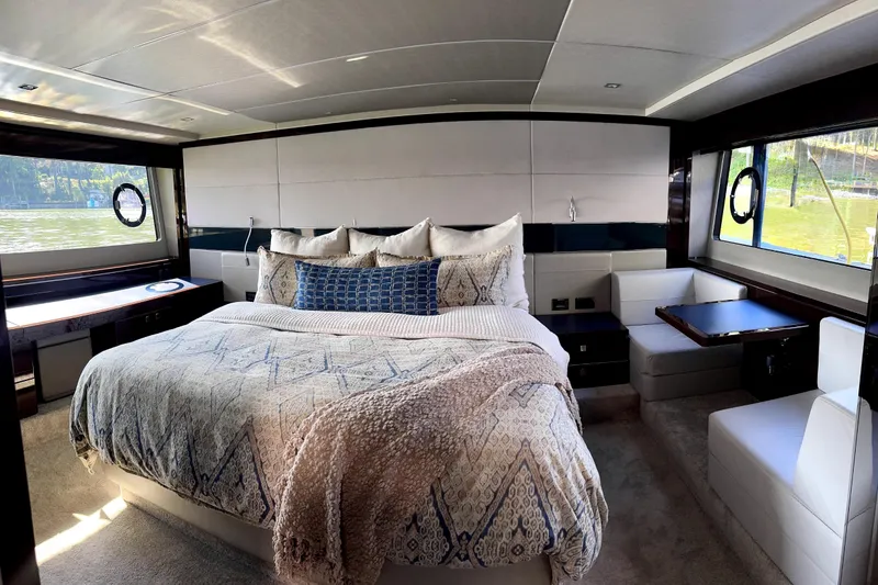 Slide: The Image of Luxurious bedroom interior of 2018 Sunseeker Predator 74 yacht with elegant bedding. - 58