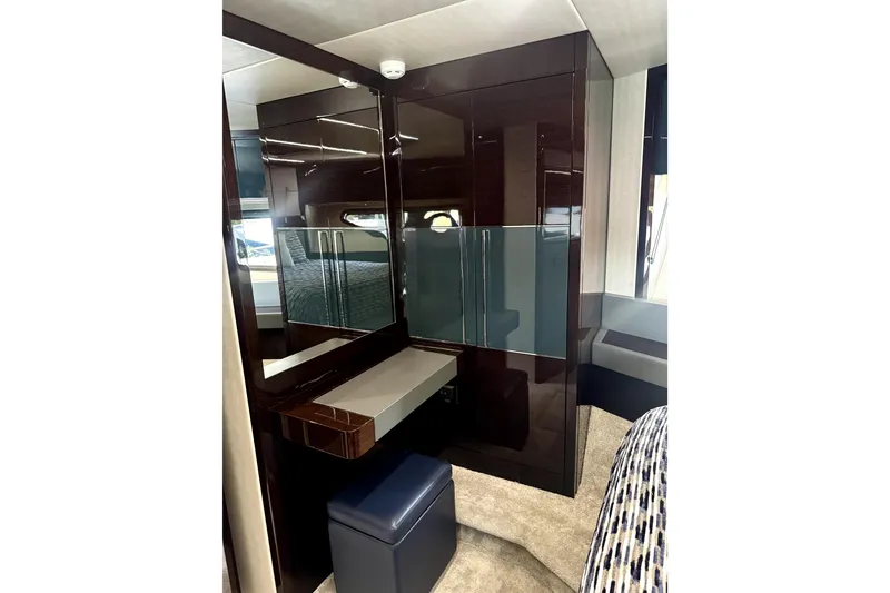 Slide: The Image of Luxurious interior of 2018 Sunseeker Predator 74 yacht with sleek wood finishes and modern design. - 69