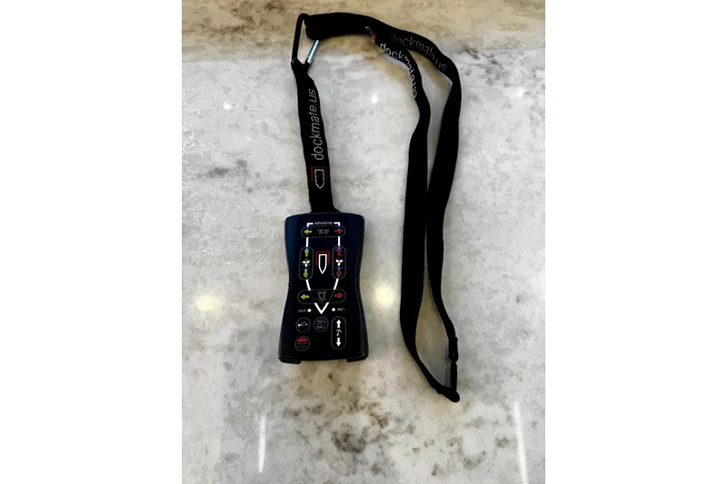 Slide: The Image of Remote control for Sunseeker Predator 74 yacht, 2018 model, on a marble surface. - 71