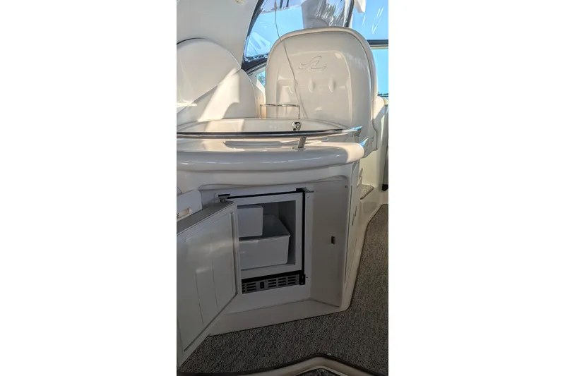 Slide: The Image of Interior view of 2006 Sea Ray 340 Sundancer yacht with seating and table. - 12