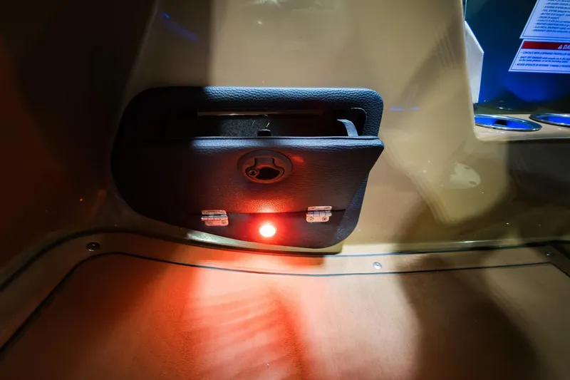 Slide: The Image of Interior detail of 2026 Godfrey Monaco 255 boat with illuminated compartment and cup holders. - 13