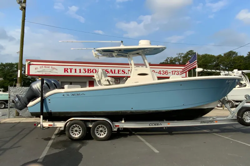 The Image of 2023 Cobia 262 Center Console boat on trailer at RT 113 Boat Sales. - 1
