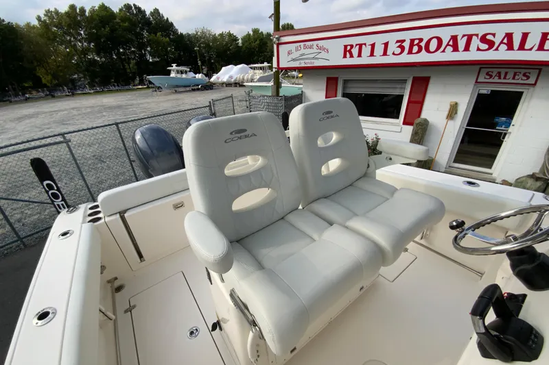 Slide: The Image of 2023 Cobia 262 Center Console boat seats at dealership, showcasing luxury and comfort. - 31