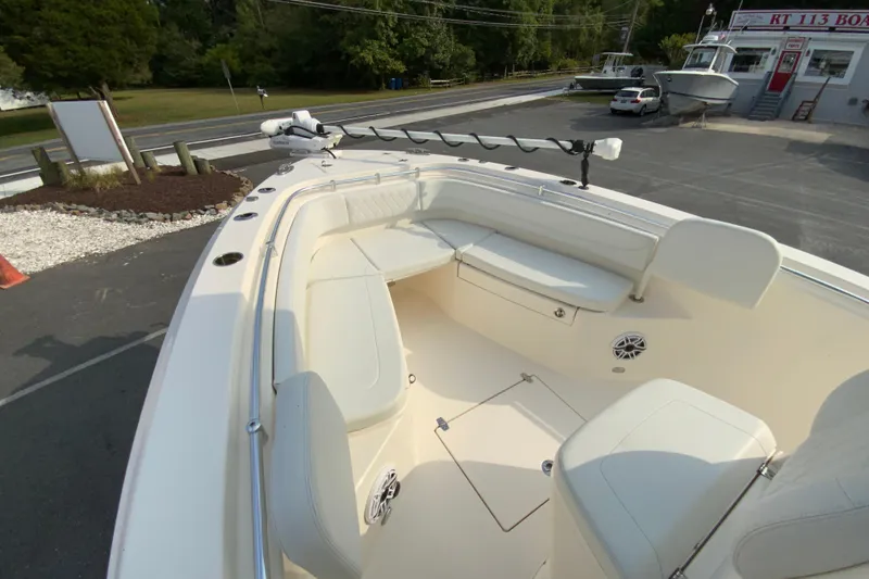 Slide: The Image of 2023 Cobia 262 Center Console boat with spacious seating and modern design. - 48