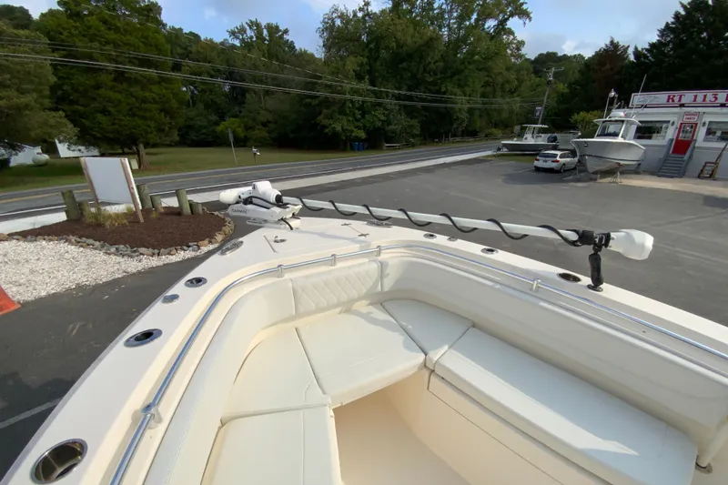 Slide: The Image of 2023 Cobia 262 Center Console boat with spacious seating and advanced navigation equipment. - 53