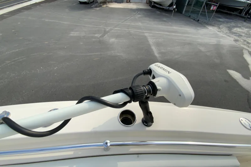 Slide: The Image of 2023 Cobia 262 Center Console with Garmin marine equipment on deck. - 55