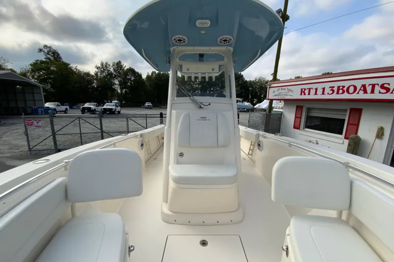 Slide: The Image of 2023 Cobia 262 Center Console boat at RT113 Boat Sales dealership. - 61