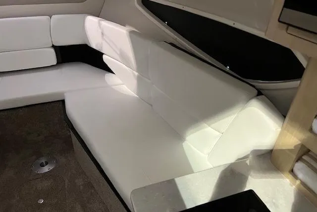 Slide: The Image of Interior of 2026 Regal 26 XO boat with white seating and modern design. - 15
