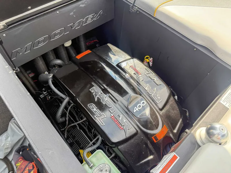 Slide: The Image of 2016 Moomba Craz engine compartment featuring a Raptor 6.2L motor. - 21