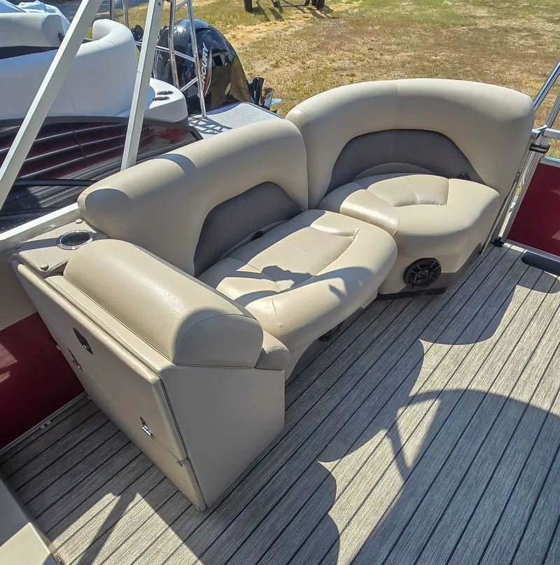 Slide: The Image of Luxurious seating on 2020 Landau ATLANTIS boat with beige upholstery and cup holder. - 13