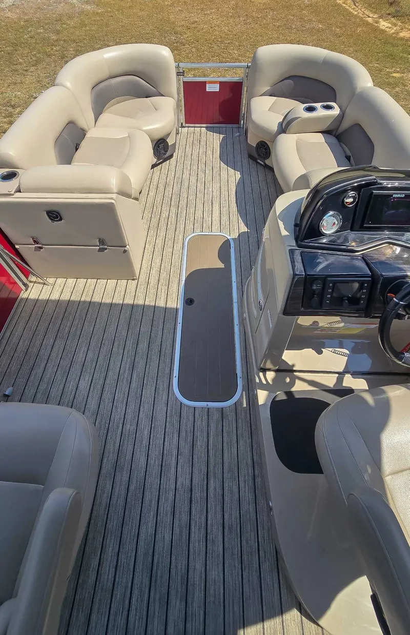 Slide: The Image of 2020 Landau ATLANTIS boat interior with plush seating and modern dashboard. - 5