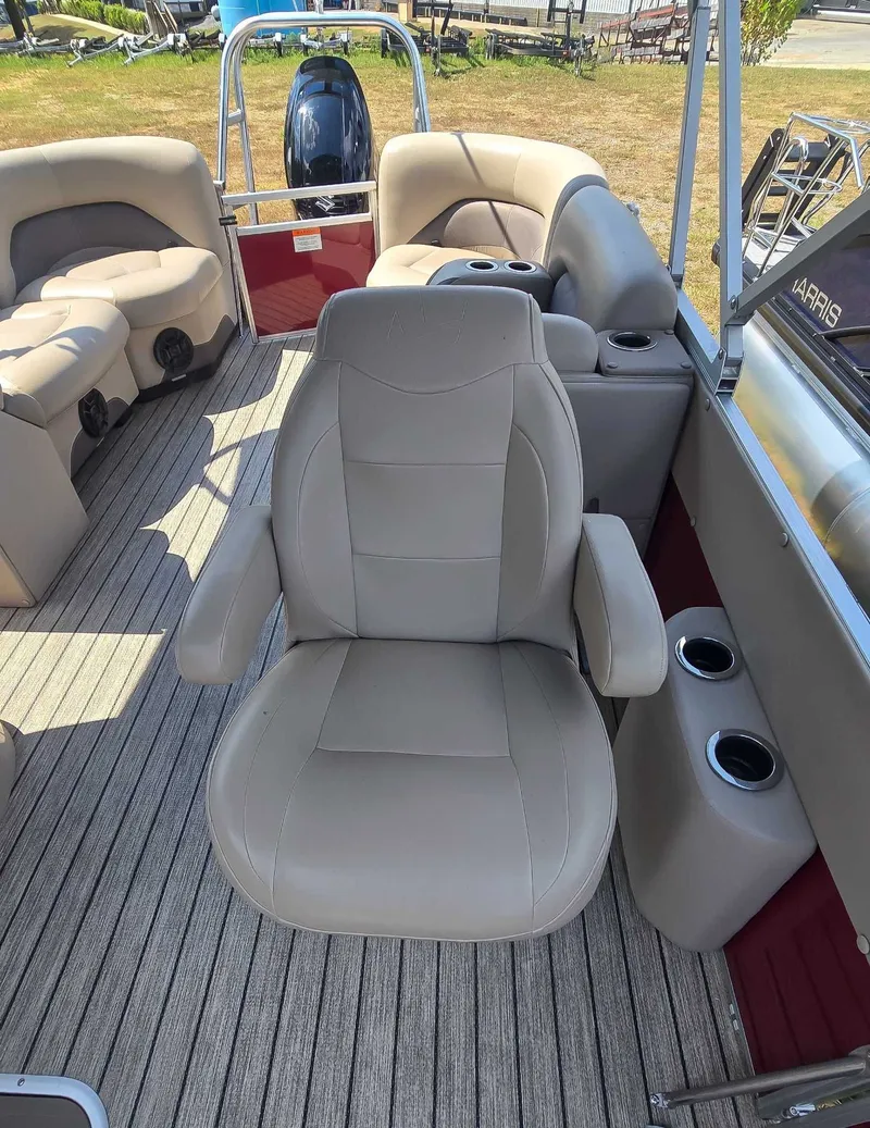 Slide: The Image of 2020 Landau ATLANTIS boat interior with beige seating and cup holders. - 8