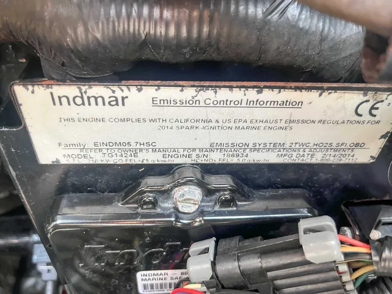 Slide: The Image of 2014 Tigé RZR Indmar engine emission control information label close-up. - 22