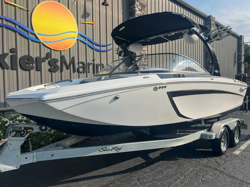 Slide: The Image of 2014 Tigé RZR boat on trailer at Skier's Marine dealership. - 3