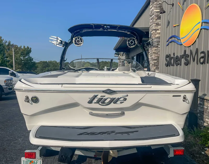 Slide: The Image of 2014 Tigé RZR boat parked outside Skier's Marine dealership. - 8