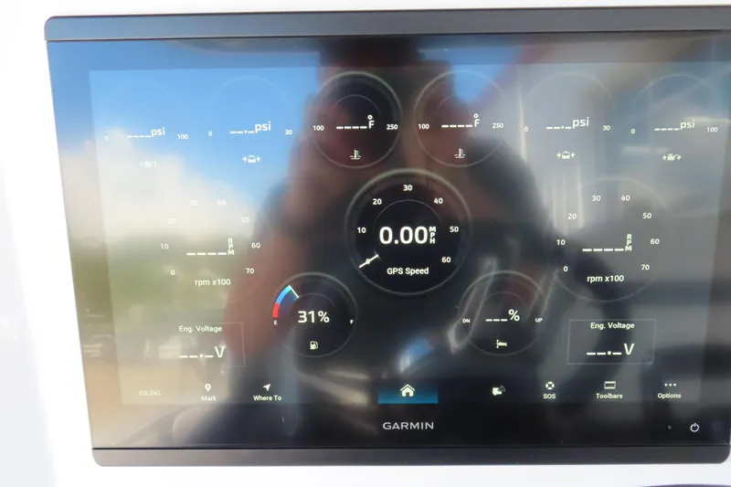 Slide: The Image of Garmin display on 2026 Sunsation 32CCX showing speed, RPM, and engine voltage. - 18