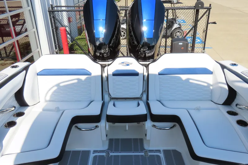 Slide: The Image of 2026 Sunsation 32CCX boat interior with sleek seating and dual engines. - 25