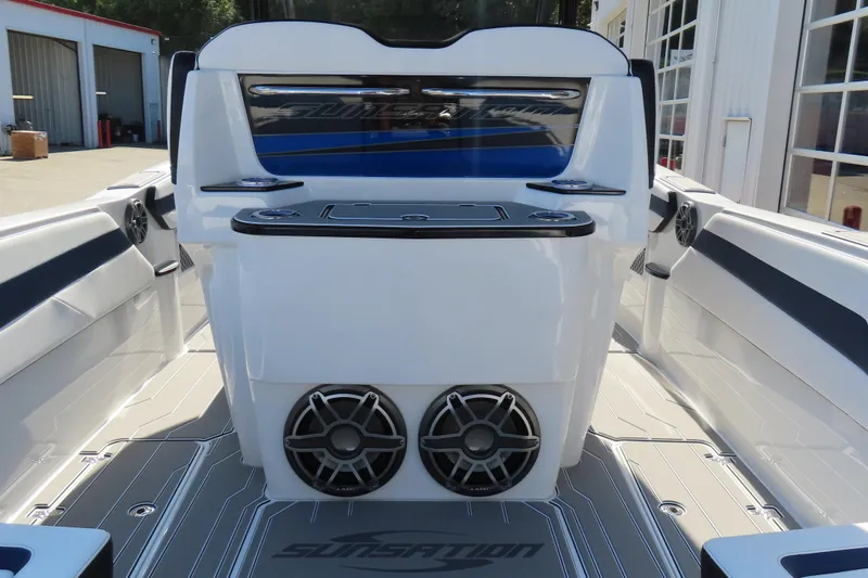 Slide: The Image of 2026 Sunsation 32CCX boat interior with sleek design and modern audio system. - 27