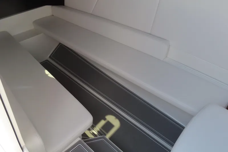 Slide: The Image of 2026 Sunsation 32CCX interior seating with sleek white upholstery and modern design. - 31