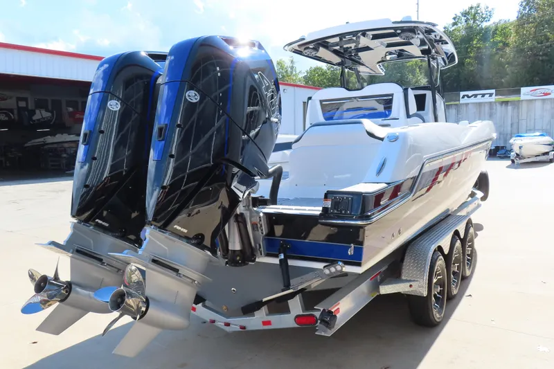 Slide: The Image of 2026 Sunsation 32CCX boat on trailer with dual outboard engines. - 5