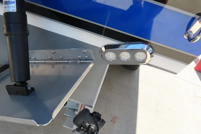 Slide: The Image of 2026 Sunsation 32CCX boat stern with trim tab and LED lights. - 8