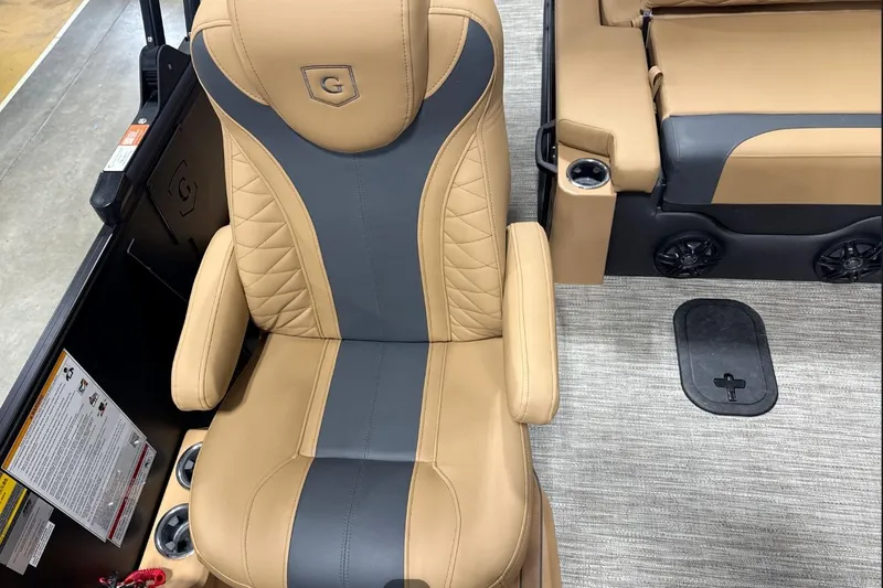 Slide: The Image of Luxurious tan and gray seating on 2026 Godfrey Monaco 23' Tritoon boat. - 11