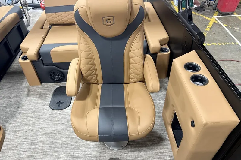 Slide: The Image of Luxurious tan and gray seating on 2026 Godfrey Monaco 23' Tritoon boat. - 13
