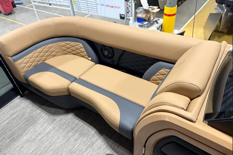 Slide: The Image of Luxurious tan and gray seating on 2026 Godfrey Monaco 23' Tritoon boat. - 6