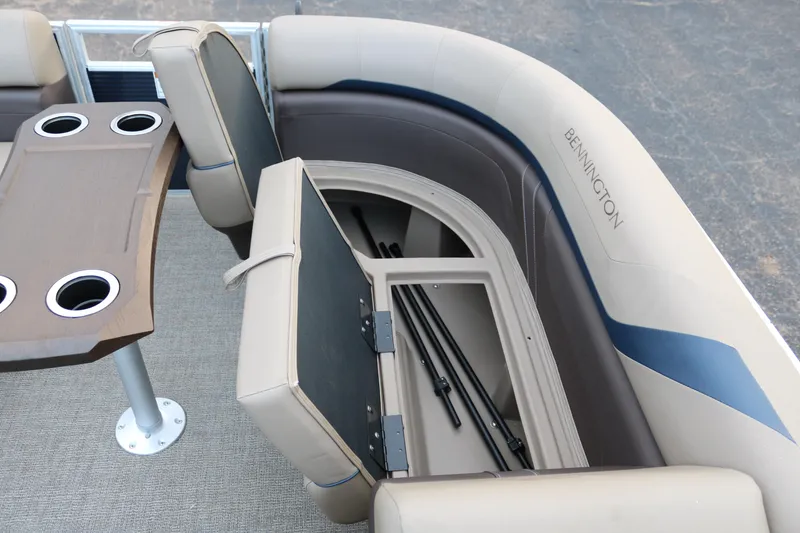 Slide: The Image of Bennington 20SSRCX STERN RADIUS 2026 boat seat with storage compartment open. - 13