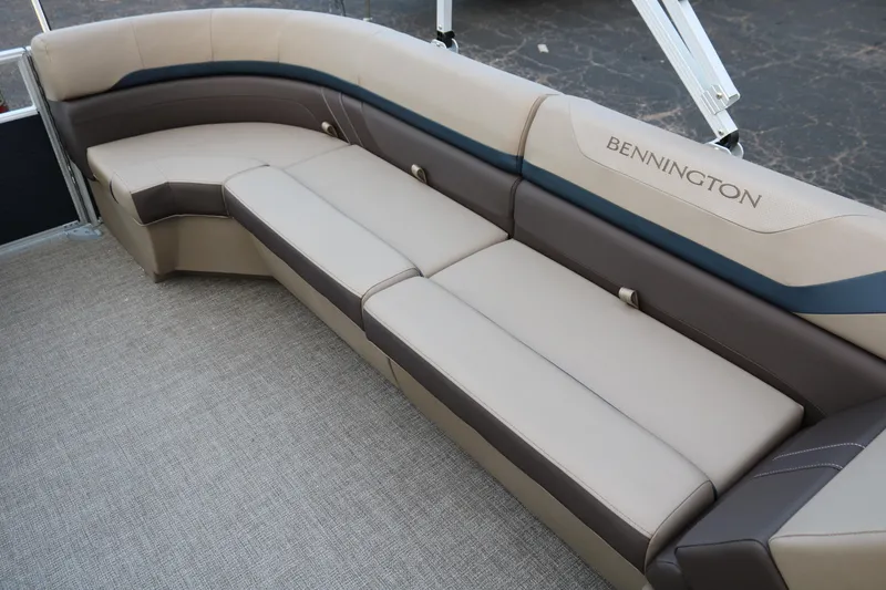 Slide: The Image of 2026 Bennington 20SSRCX Stern Radius boat interior with gray seating and modern design. - 22