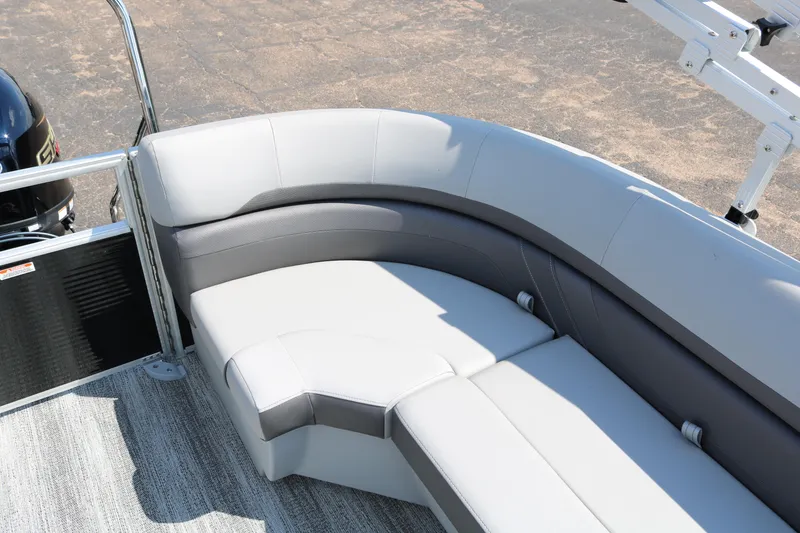 Slide: The Image of 2026 Bennington 20SSRCX STERN RADIUS boat with sleek, curved seating design. - 27