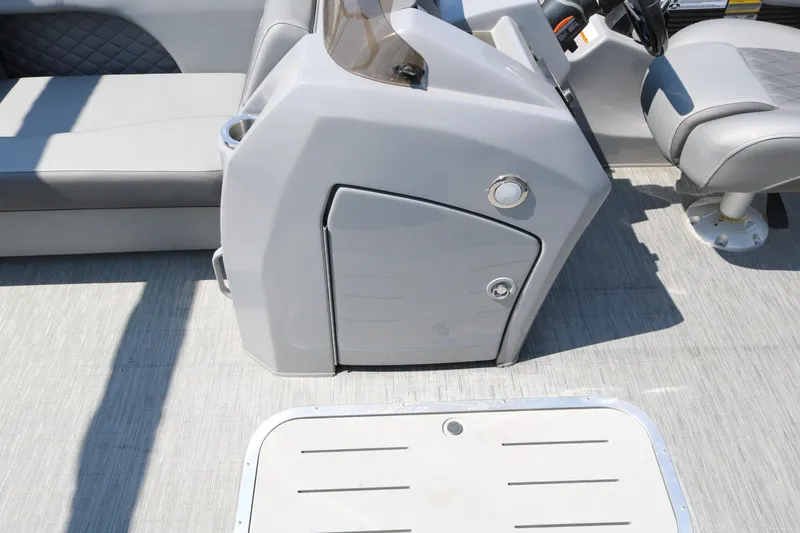 Slide: The Image of 2026 Bennington 20SSRCX STERN RADIUS boat interior with gray seating and console. - 34