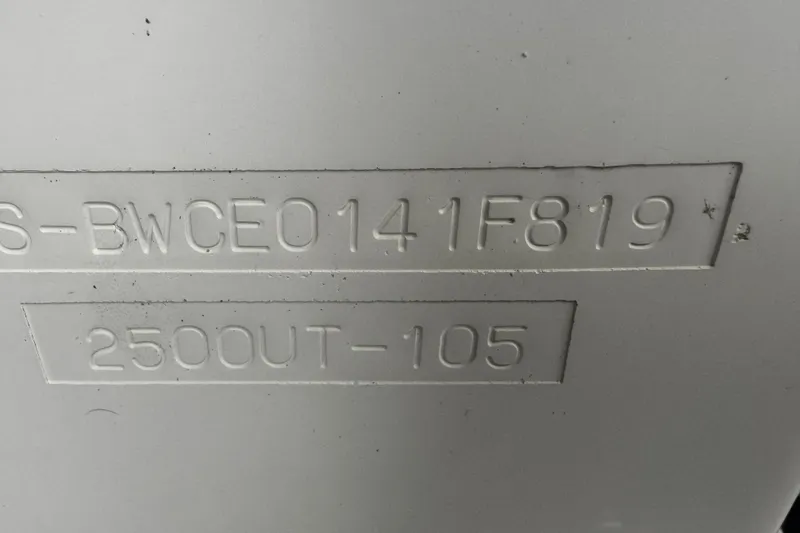 Slide: The Image of Hull identification number on 2019 Boston Whaler 26 Outrage boat. - 23