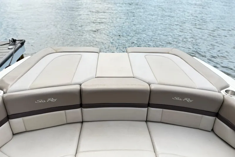 Slide: The Image of 2013 Sea Ray 250 SLX boat seating with water view. - 10